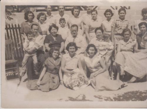 Maestros de la Esc. Carlos A. Carrillo de Nuevo Laredo festejando el 15 de mayo. Ca. 1955.
