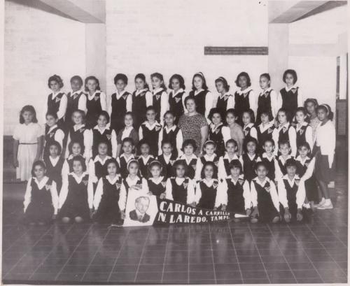 Quinto año Esc. Carlos A. Carrillo. Profra Ma. del Rosario López Ramos. Oct. 24 de 1964.